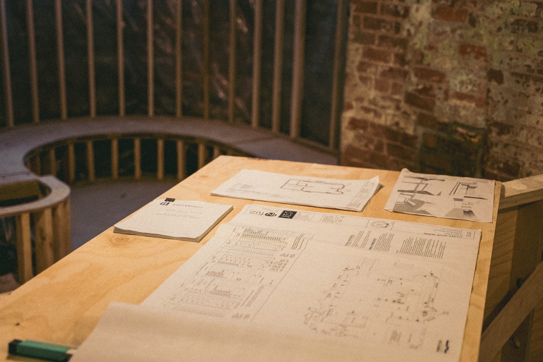 Coffeehaus equipment spec book and architect drawings for Cafe Sous Terre on a plywood bar