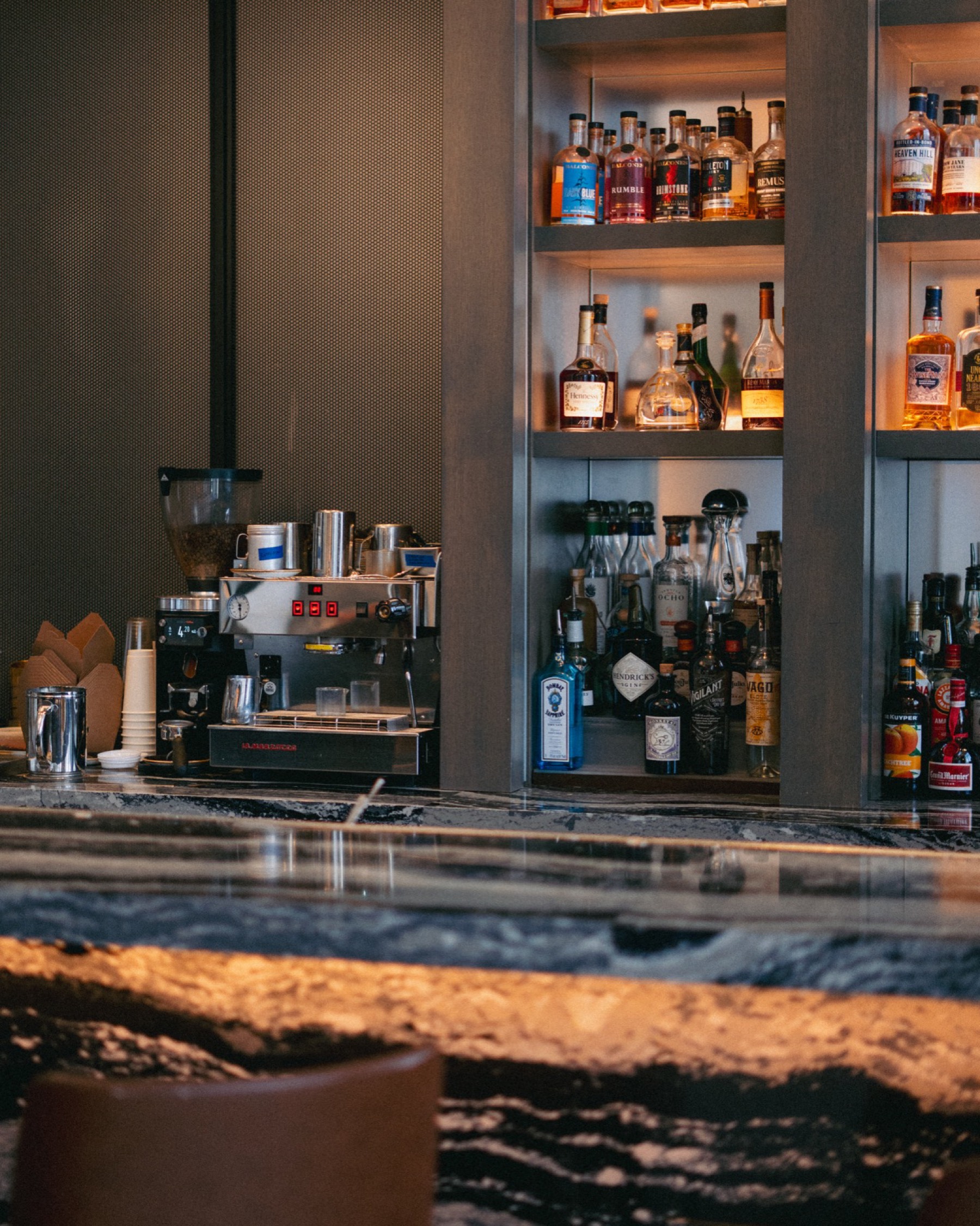 Godfrey Hotel bar with the coffee program alongside the spirits shelf
