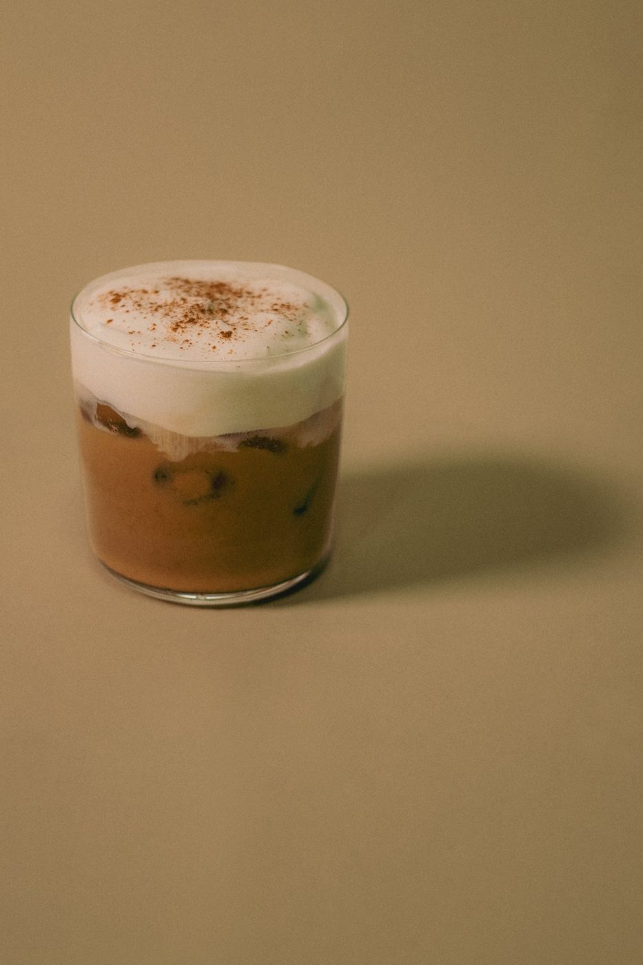 Iced pumpkin spice latte with cold foam, made in the Fall Drink Building class