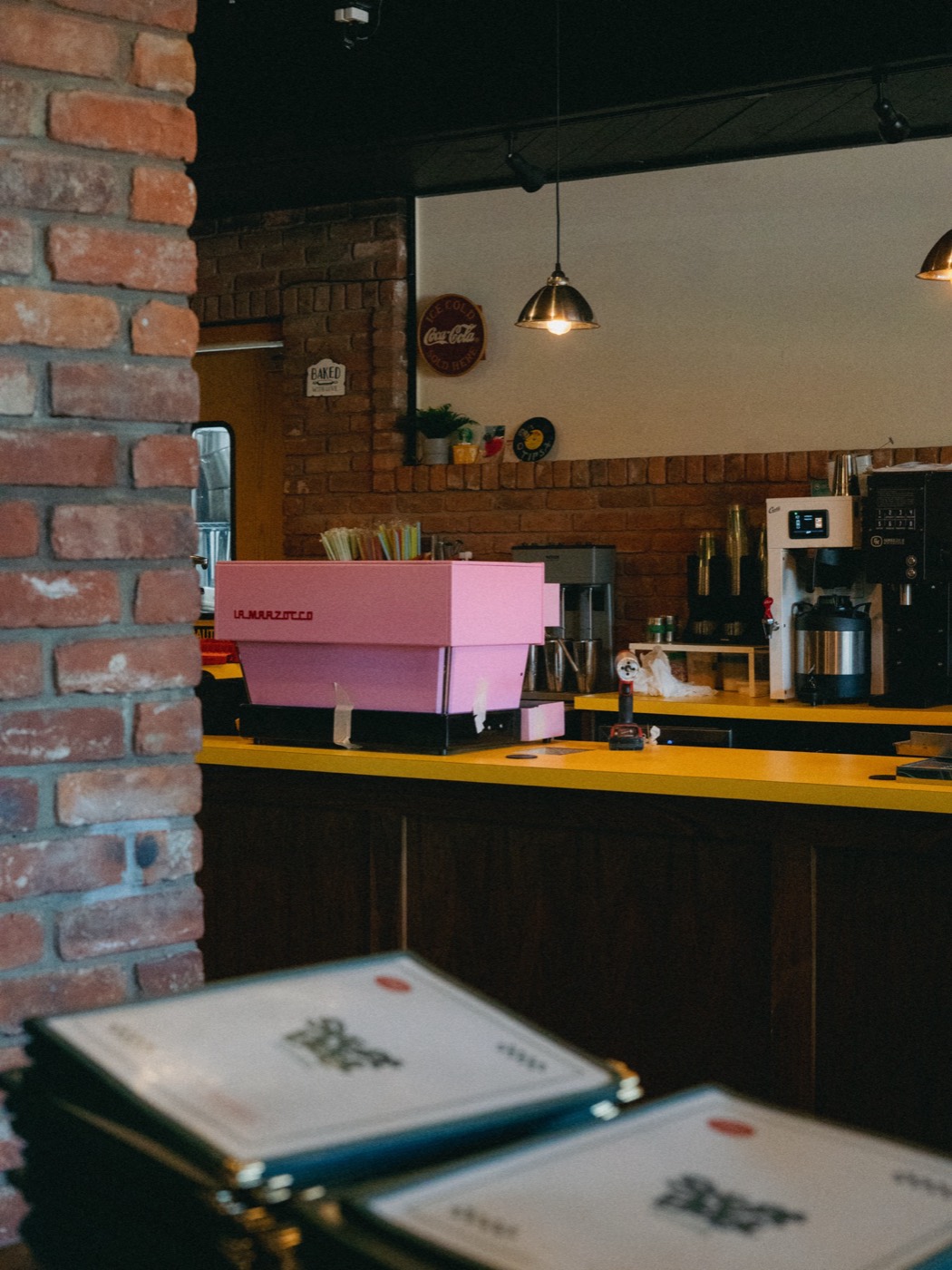La Marzocco espresso machine with Coffeehaus service sticker