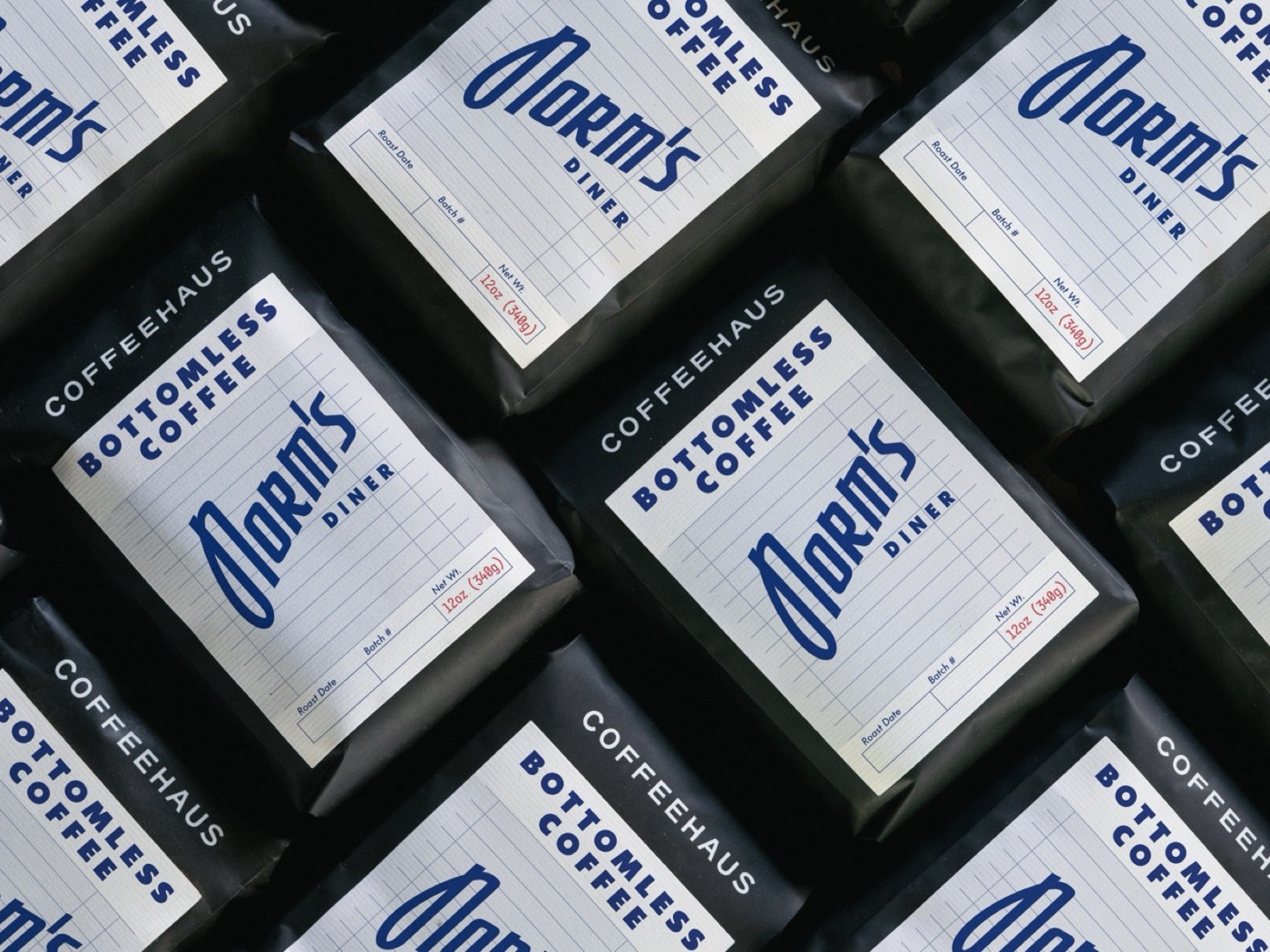 Coffeehaus private label bags for Norm's Diner, Bottomless Coffee, arranged in a flatlay